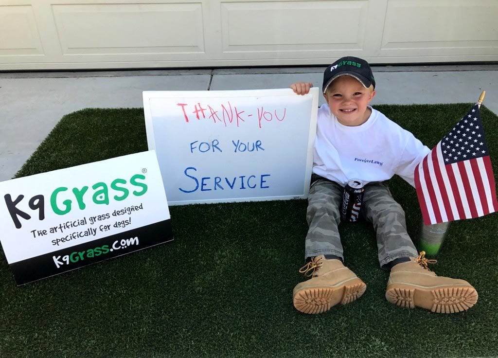 Carter sitting on K9Grass with a message to the troops