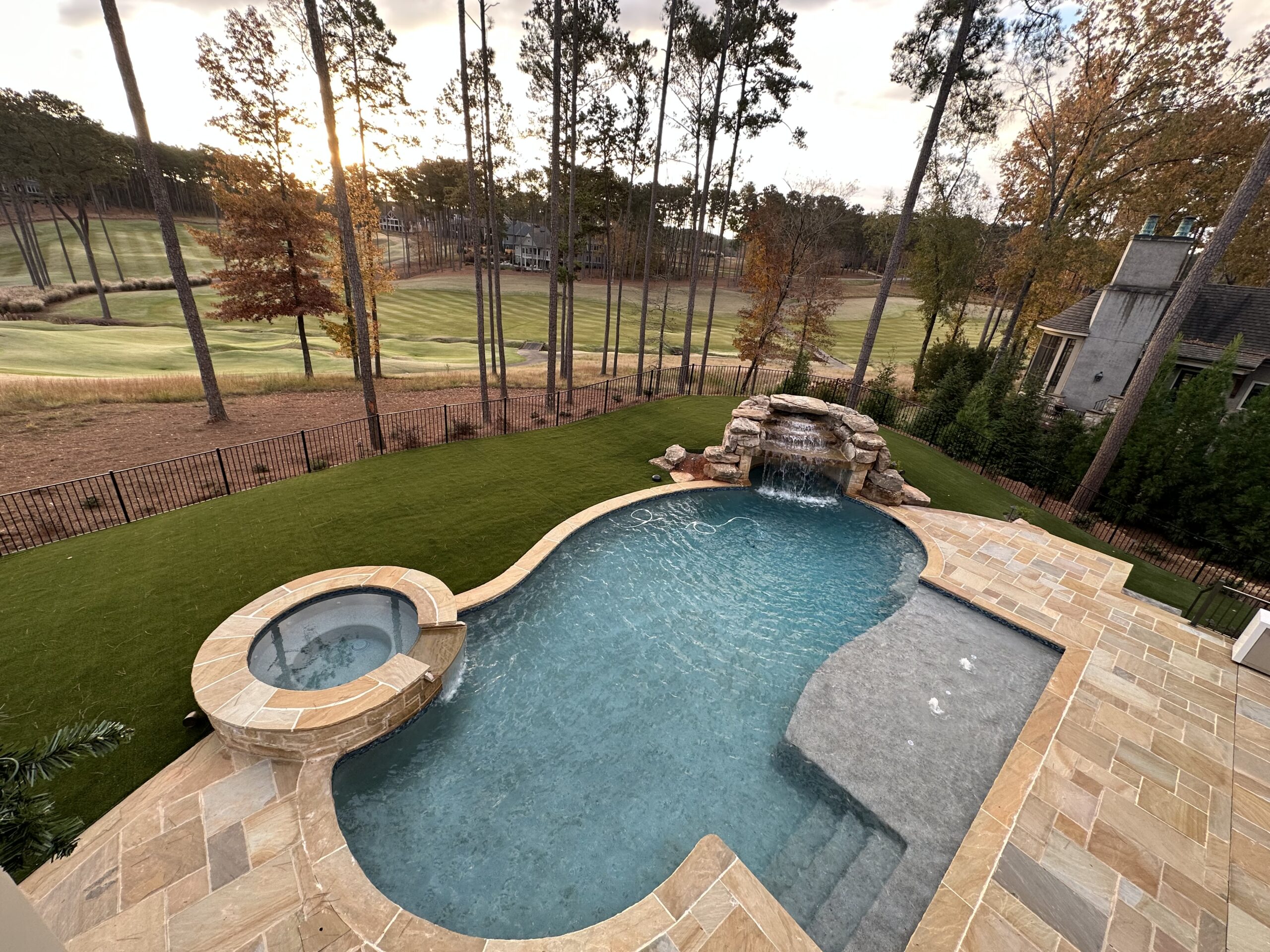 Backyard with pool and K9Grass synthetic grass